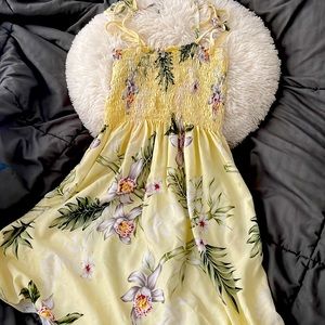 I bought this dress in Hawaii about five months ago it’s never been worn.